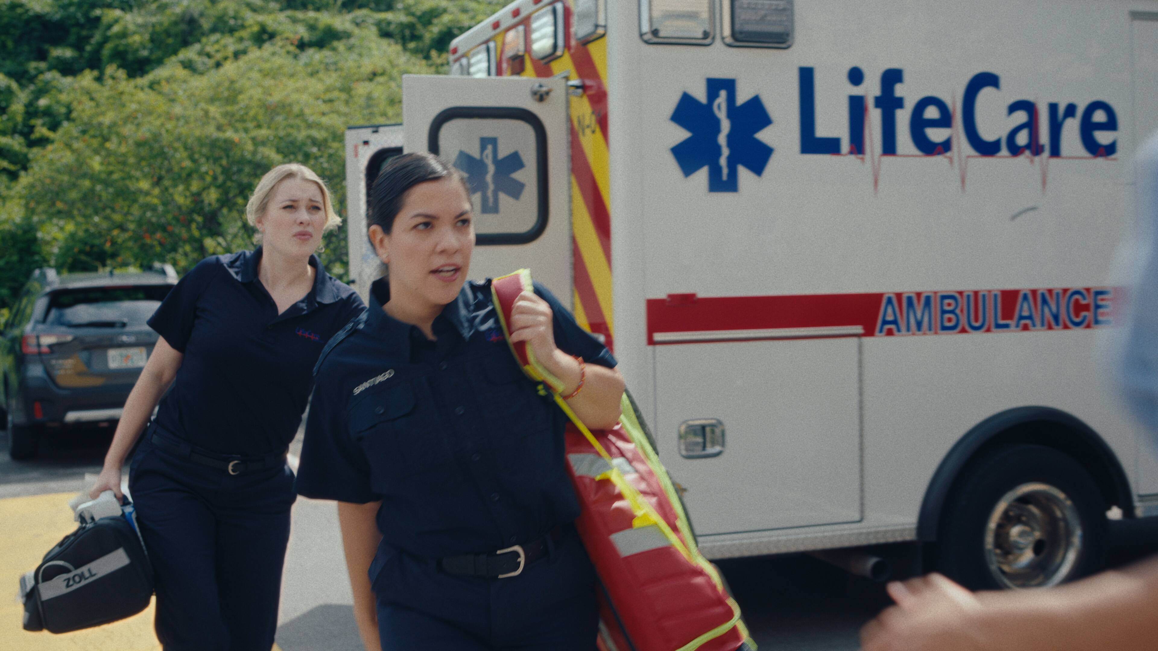 Dani and Liz answering a call on the job as EMT in county rescue