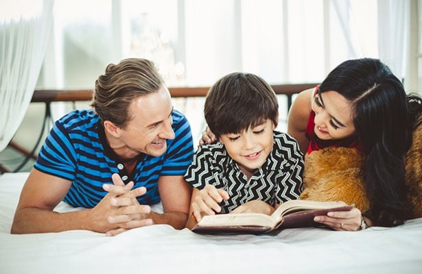 family-reading-on-bed-blog-header