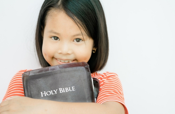 girl-holding-bible-blog-header