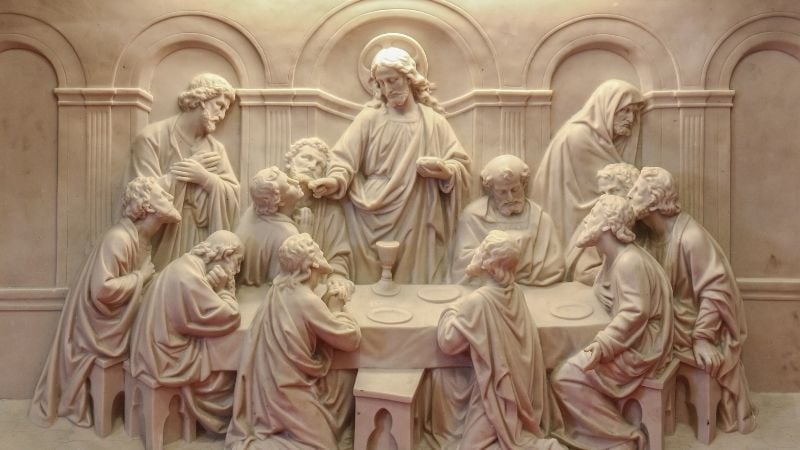 stone carving of Christ at the last supper